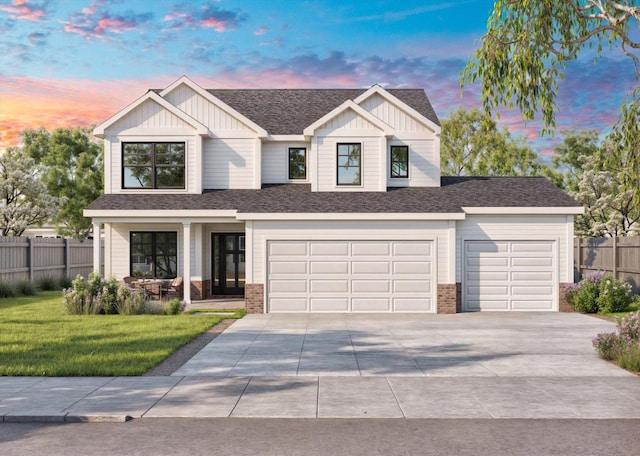 602 Wheatley Dr, Mahomet, IL 61853 - view of front of home featuring board and batten siding, a yard, concrete driveway, and fence