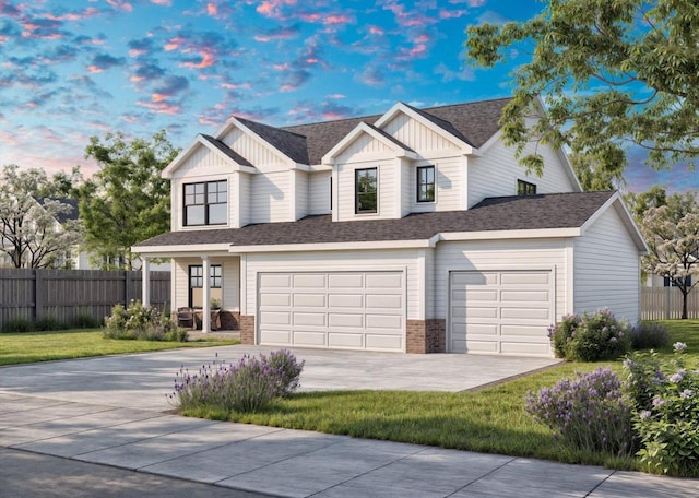 602 Wheatley Dr, Mahomet, IL 61853 - traditional home featuring roof with shingles, concrete driveway, fence, an attached garage, and board and batten siding