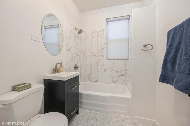 bathroom featuring vanity, toilet, bathing tub / shower combination, and baseboards