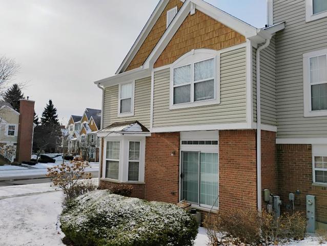 view of snow covered property