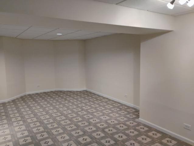 empty room with a drop ceiling