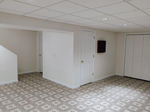 basement with a drop ceiling