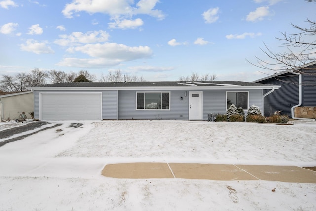 ranch-style home featuring a garage