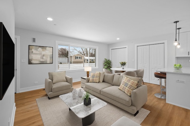 living room with light wood-type flooring