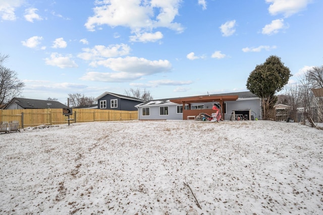 view of snow covered property