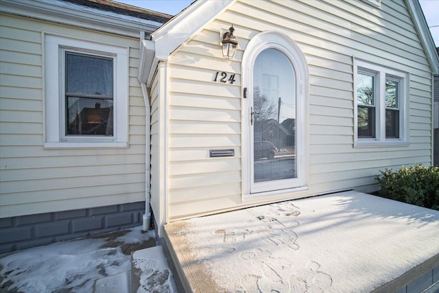 doorway to property featuring a patio