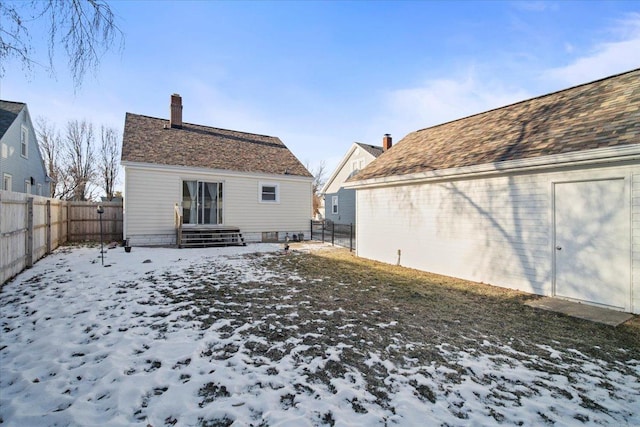 view of snow covered house