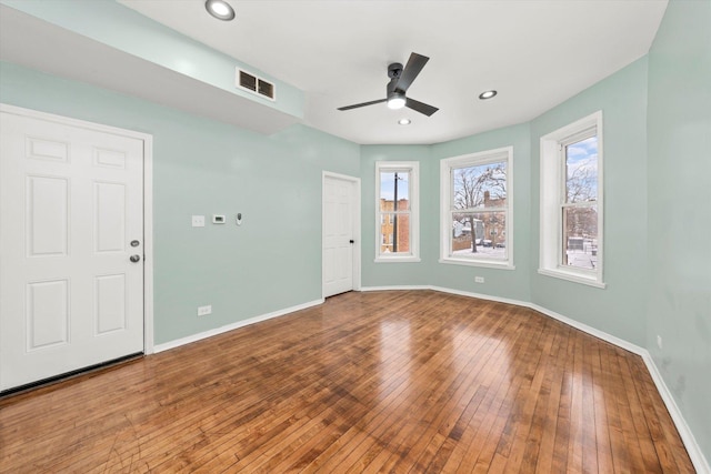 unfurnished room featuring wood-type flooring and ceiling fan