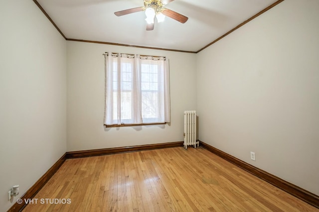 unfurnished room with light hardwood / wood-style flooring, radiator heating unit, ornamental molding, and ceiling fan