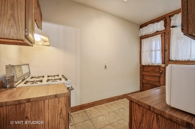 kitchen with light tile patterned floors