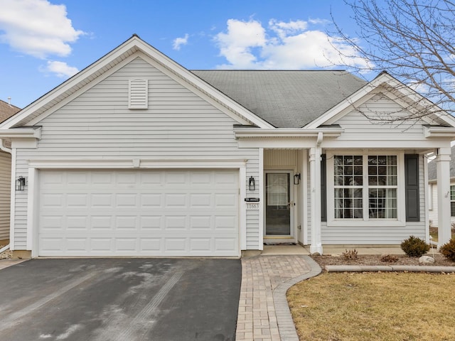 view of front of property featuring a garage