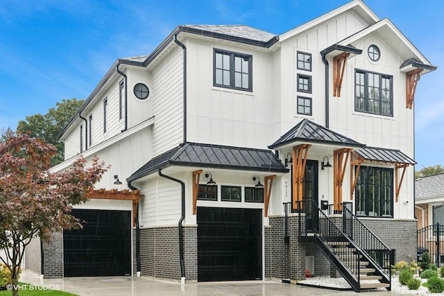 modern farmhouse featuring a garage