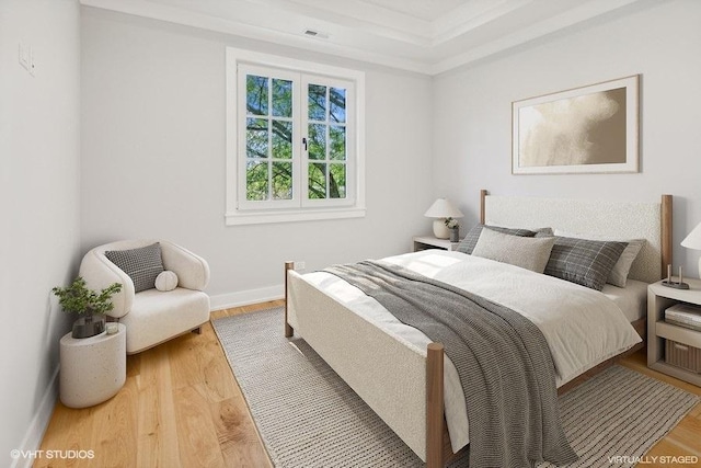 bedroom featuring hardwood / wood-style floors