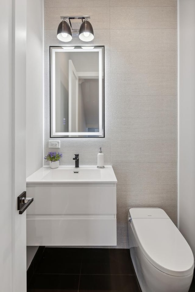 bathroom with vanity and toilet