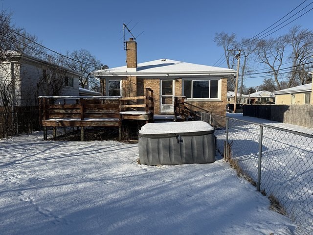 view of snow covered property