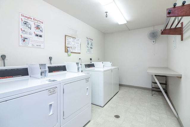 washroom featuring washing machine and dryer