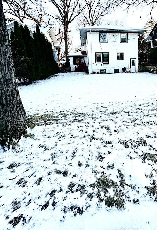 view of yard layered in snow