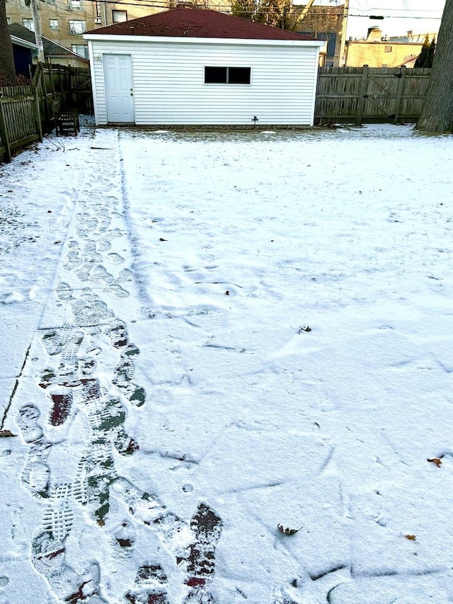 view of yard covered in snow