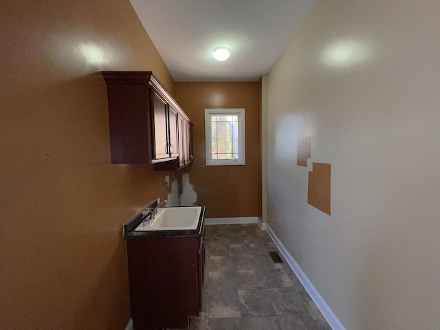 laundry area featuring sink