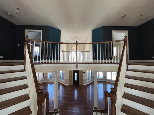 stairs with hardwood / wood-style flooring