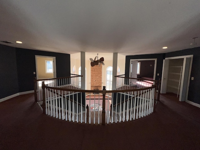 hallway featuring a notable chandelier