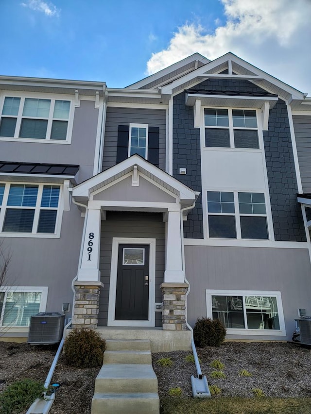 view of front of home with central AC unit