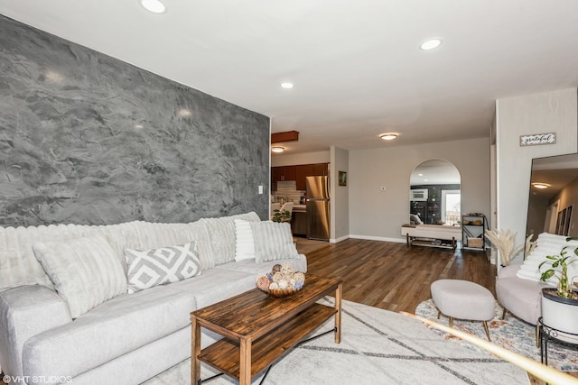 living room featuring dark hardwood / wood-style flooring