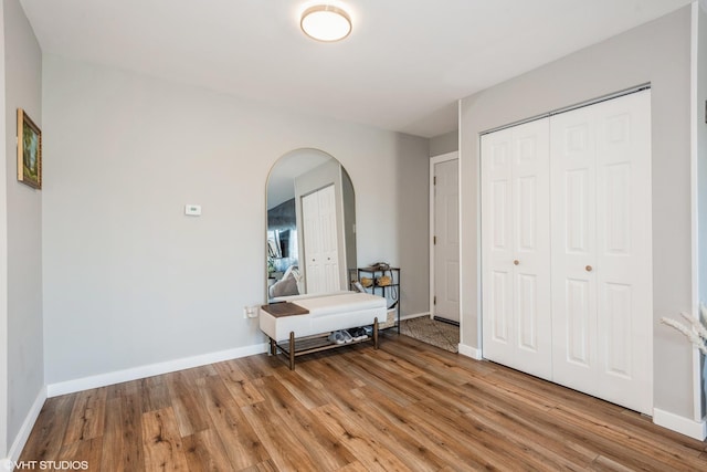 hallway featuring light hardwood / wood-style flooring