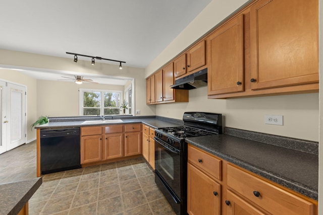 kitchen with rail lighting, sink, kitchen peninsula, ceiling fan, and black appliances