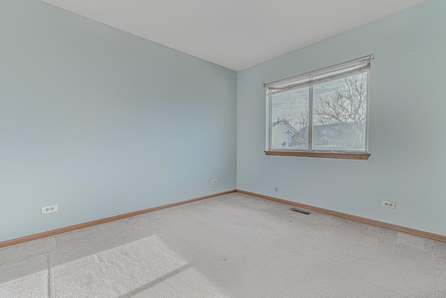 spare room with carpet flooring