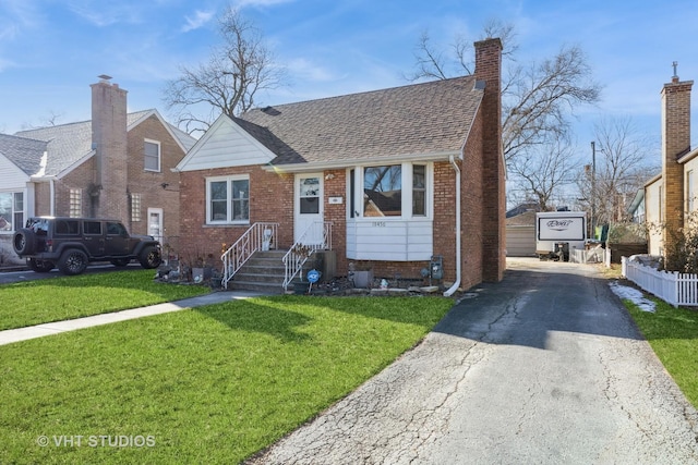 view of front of home with a front yard