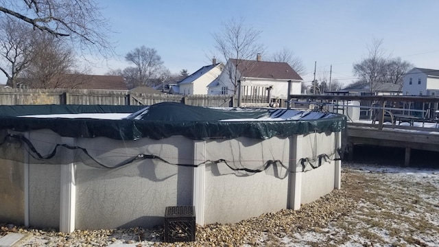 view of pool featuring fence, a deck, and a fenced in pool