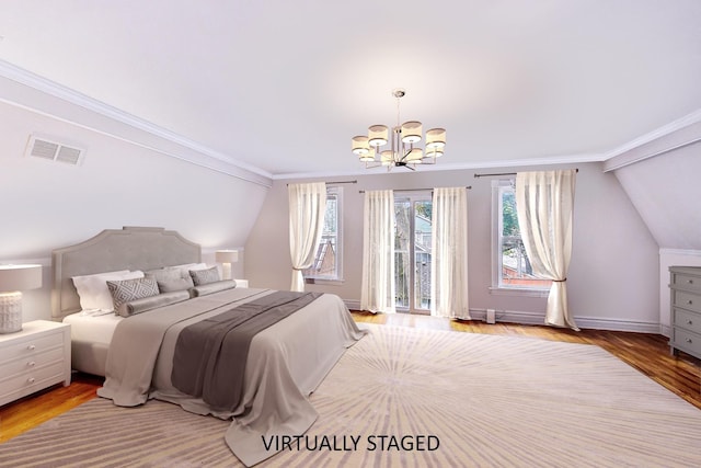 bedroom with visible vents, ornamental molding, wood finished floors, access to outside, and a notable chandelier