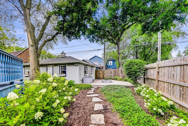 view of yard featuring a fenced backyard and a patio