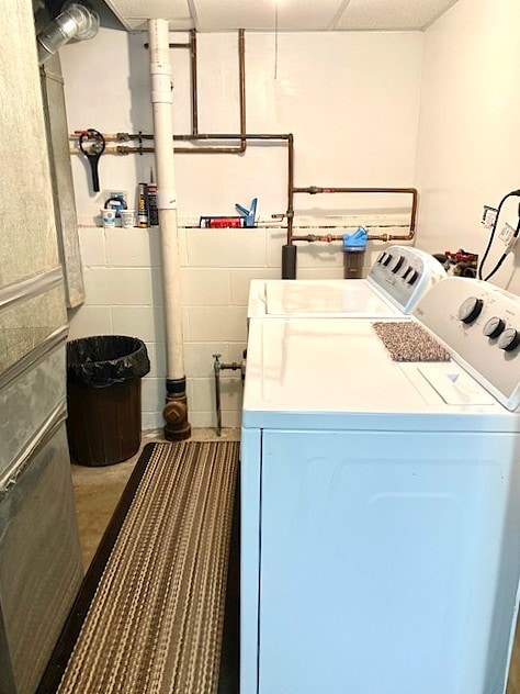 laundry room with washer and dryer