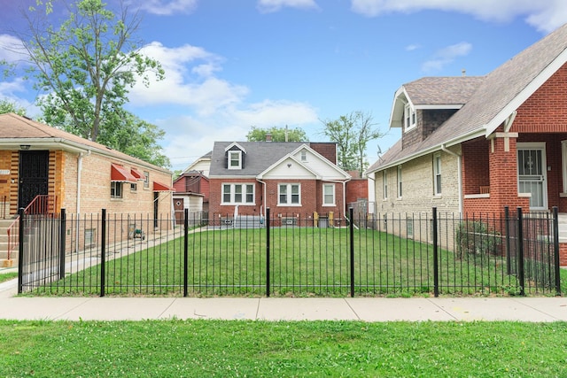 bungalow-style home featuring a front lawn