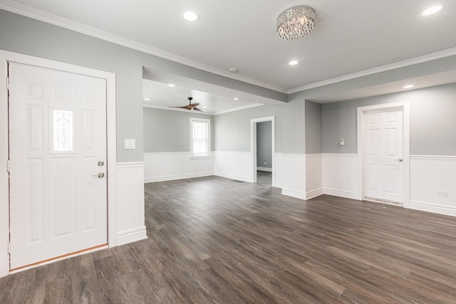 entrance foyer featuring crown molding, ceiling fan, and dark hardwood / wood-style floors