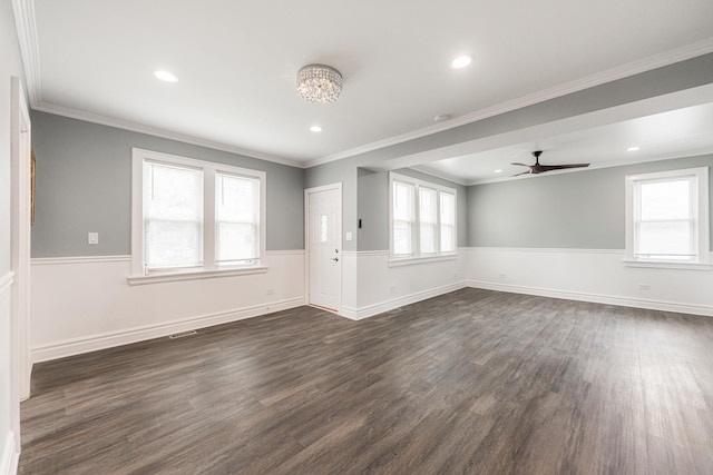 interior space featuring ornamental molding, dark hardwood / wood-style floors, and ceiling fan