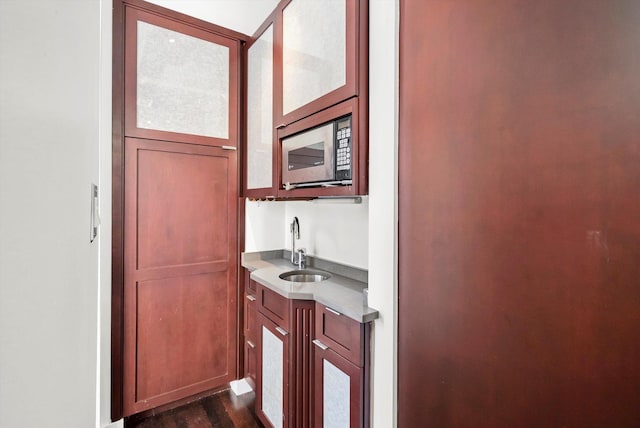 bathroom featuring vanity and wood finished floors