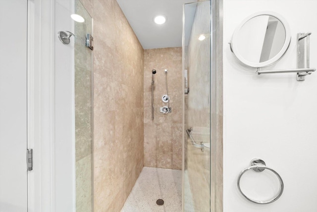 bathroom featuring a tile shower