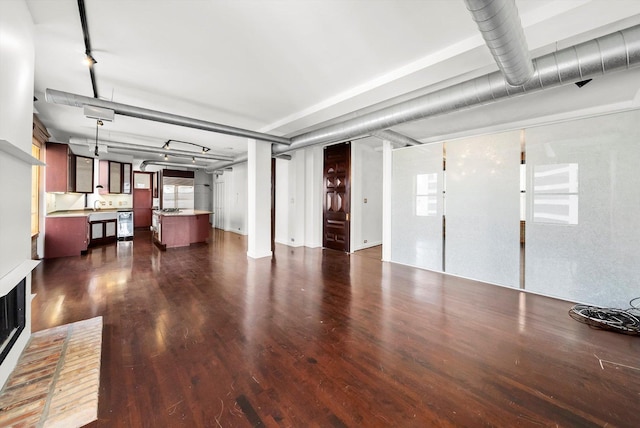 interior space with sink and dark hardwood / wood-style floors