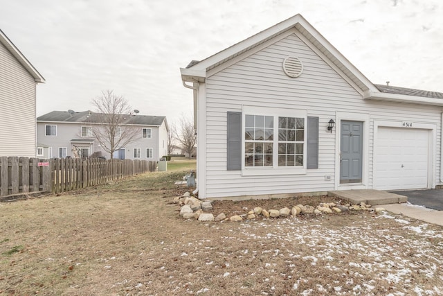 view of front of home with a garage