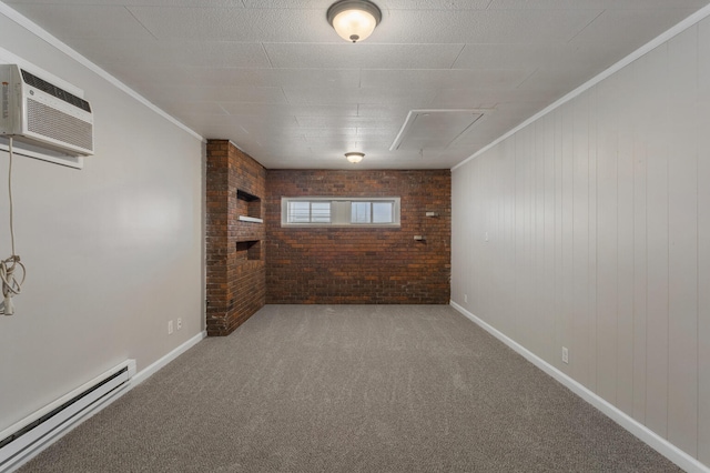 carpeted empty room with crown molding, brick wall, a baseboard heating unit, and a wall unit AC