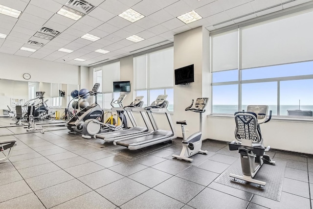 gym featuring a paneled ceiling