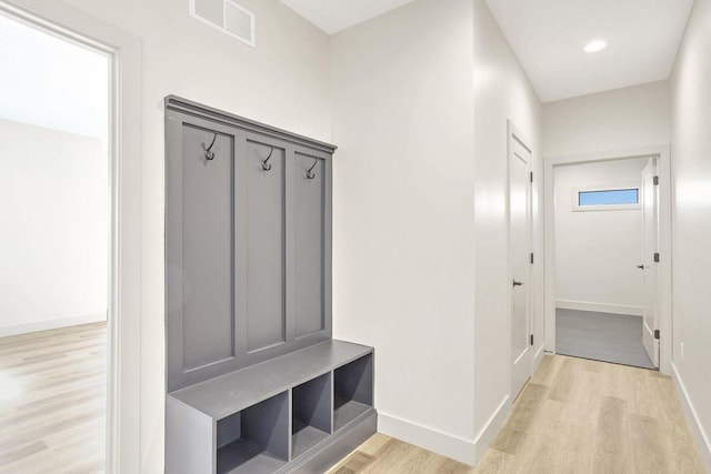 mudroom with light wood-type flooring