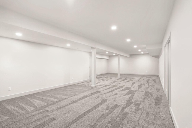 basement with light colored carpet