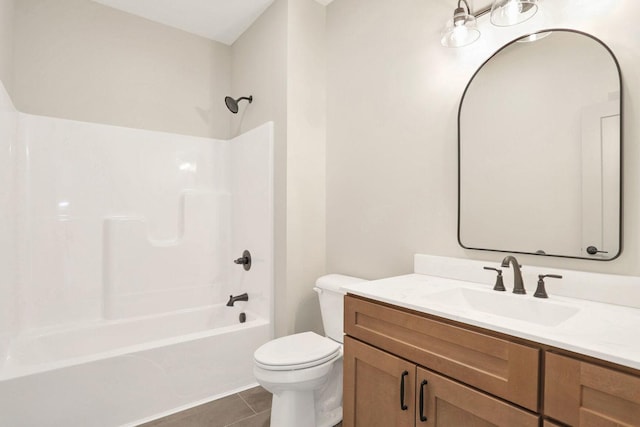 full bathroom featuring shower / tub combination, tile patterned floors, toilet, and vanity