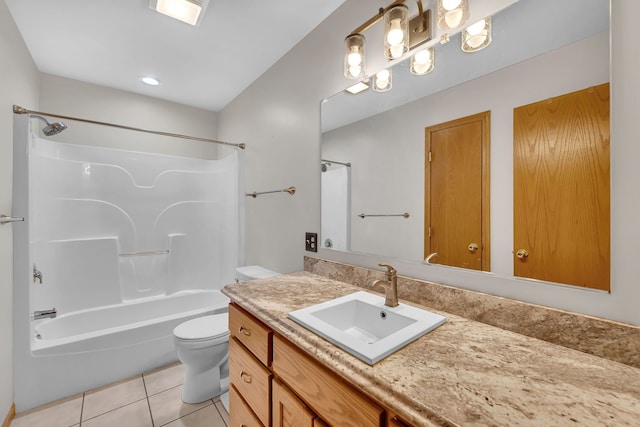 full bathroom featuring vanity, toilet, tub / shower combination, and tile patterned flooring