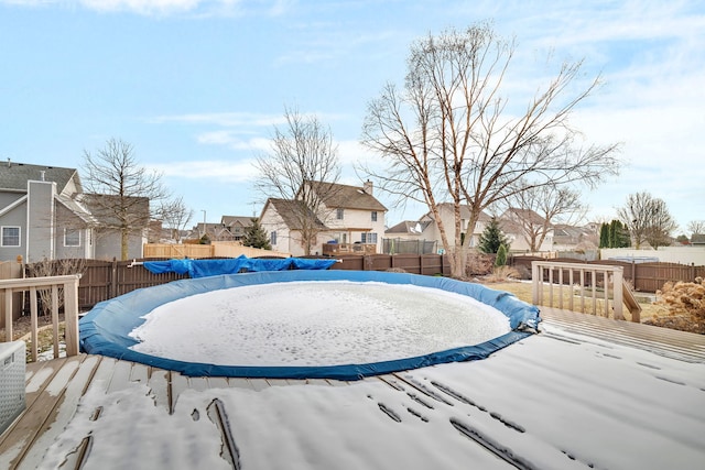 view of yard with a covered pool