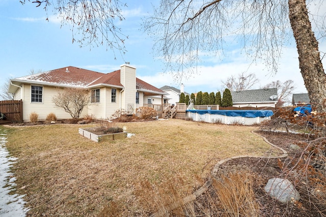 view of yard featuring a pool side deck